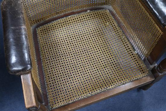A Victorian mahogany bergere armchair